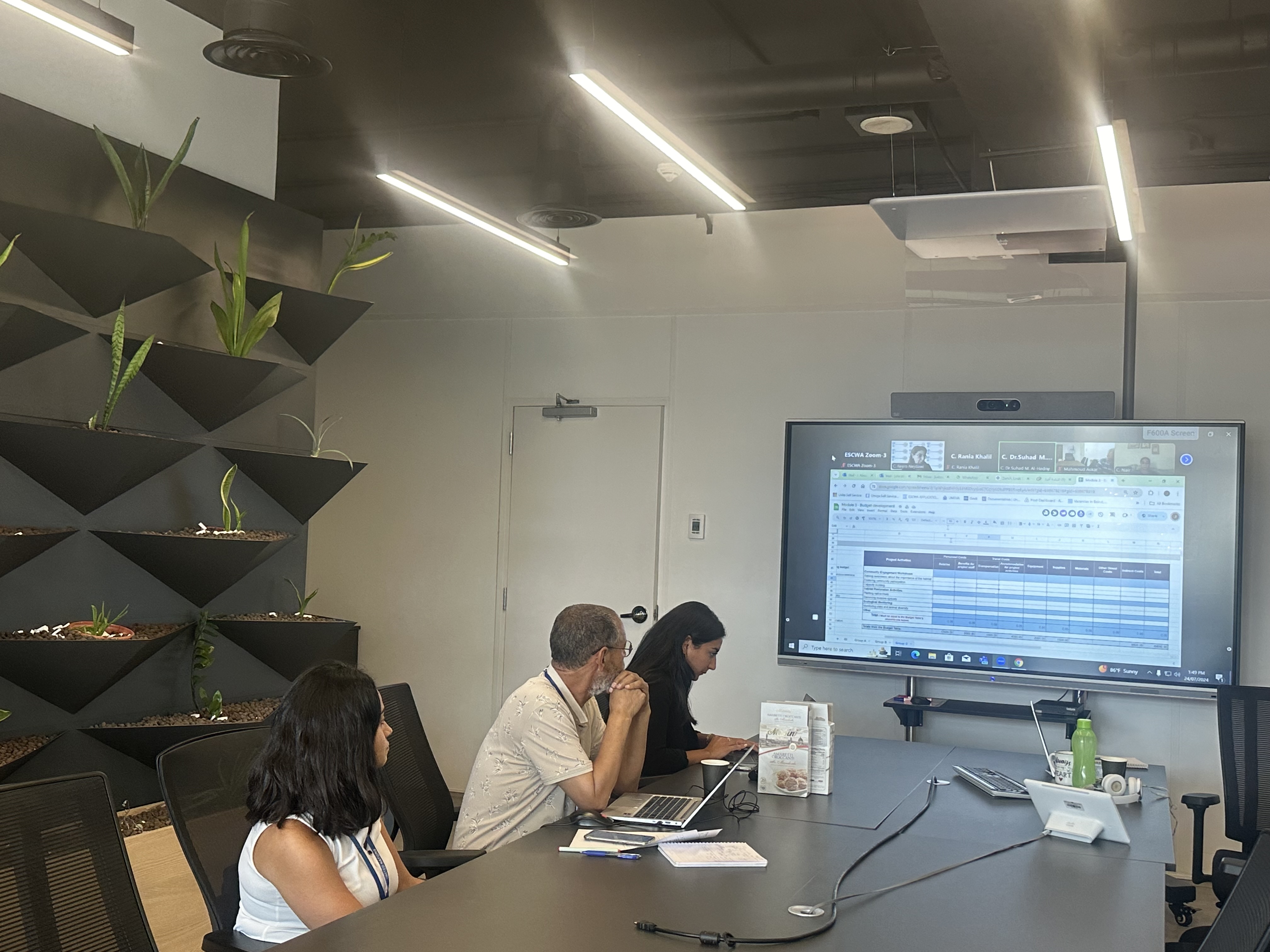 People sitting at a meeting table