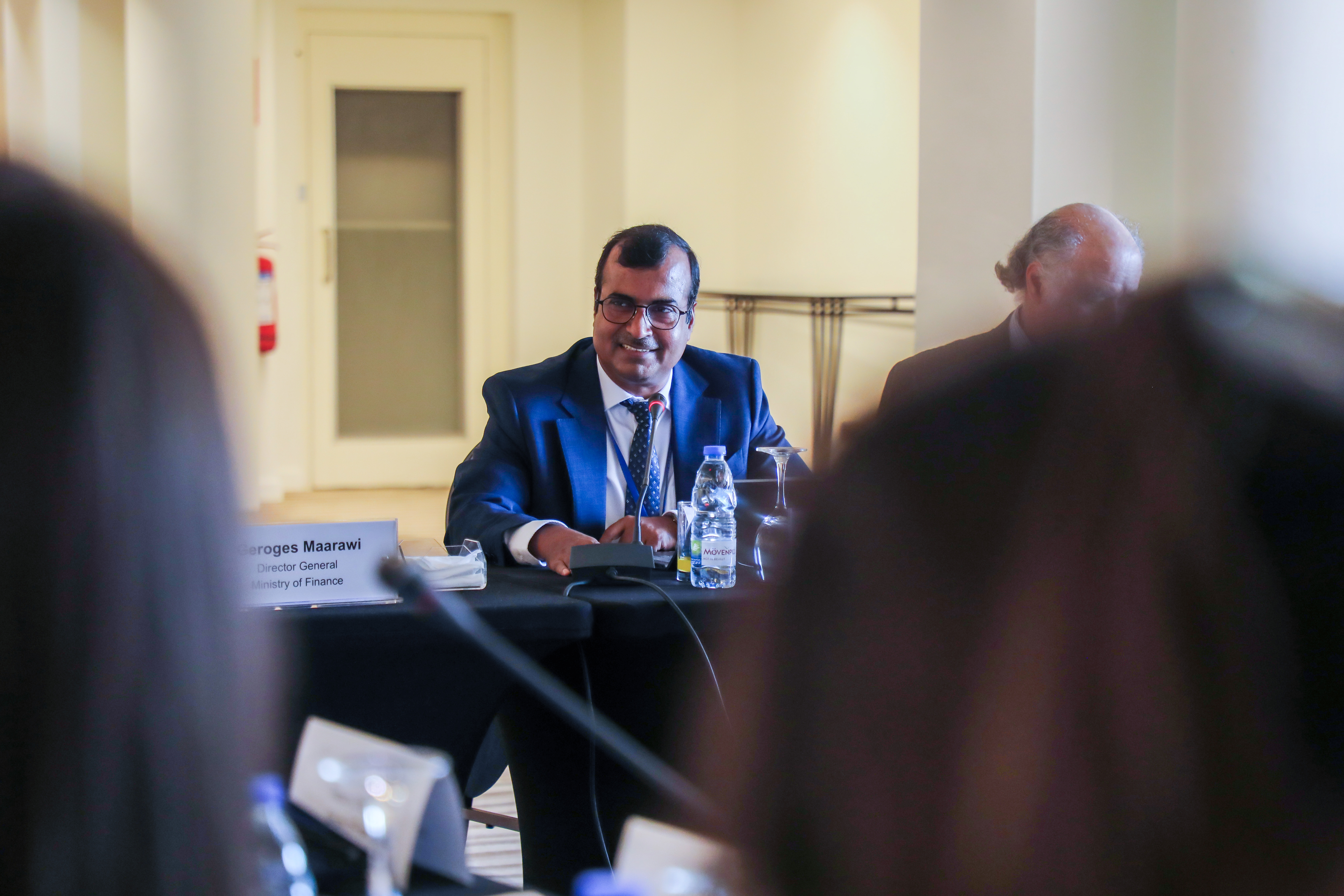 Man speaking on a panel