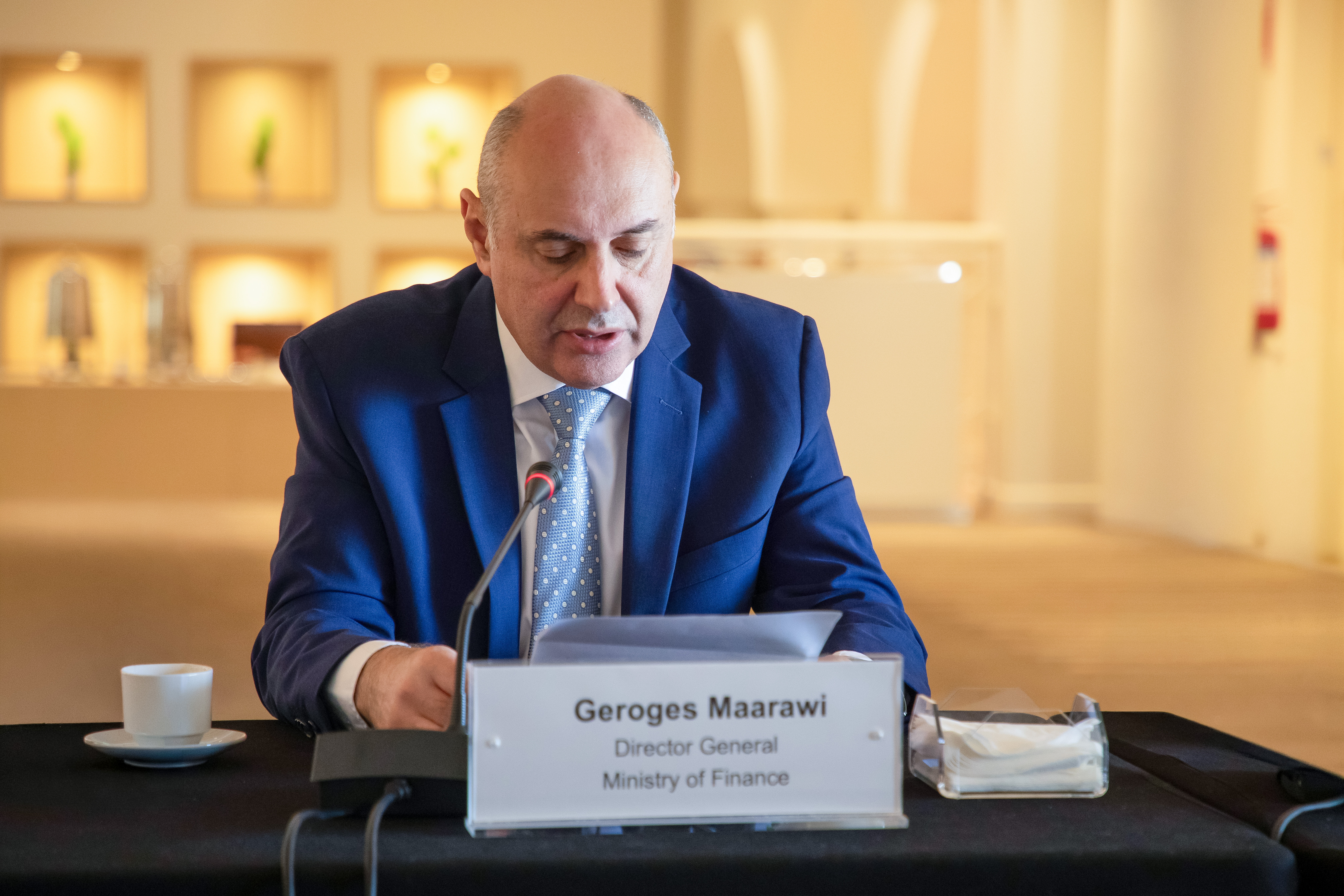 Man speaking on a panel