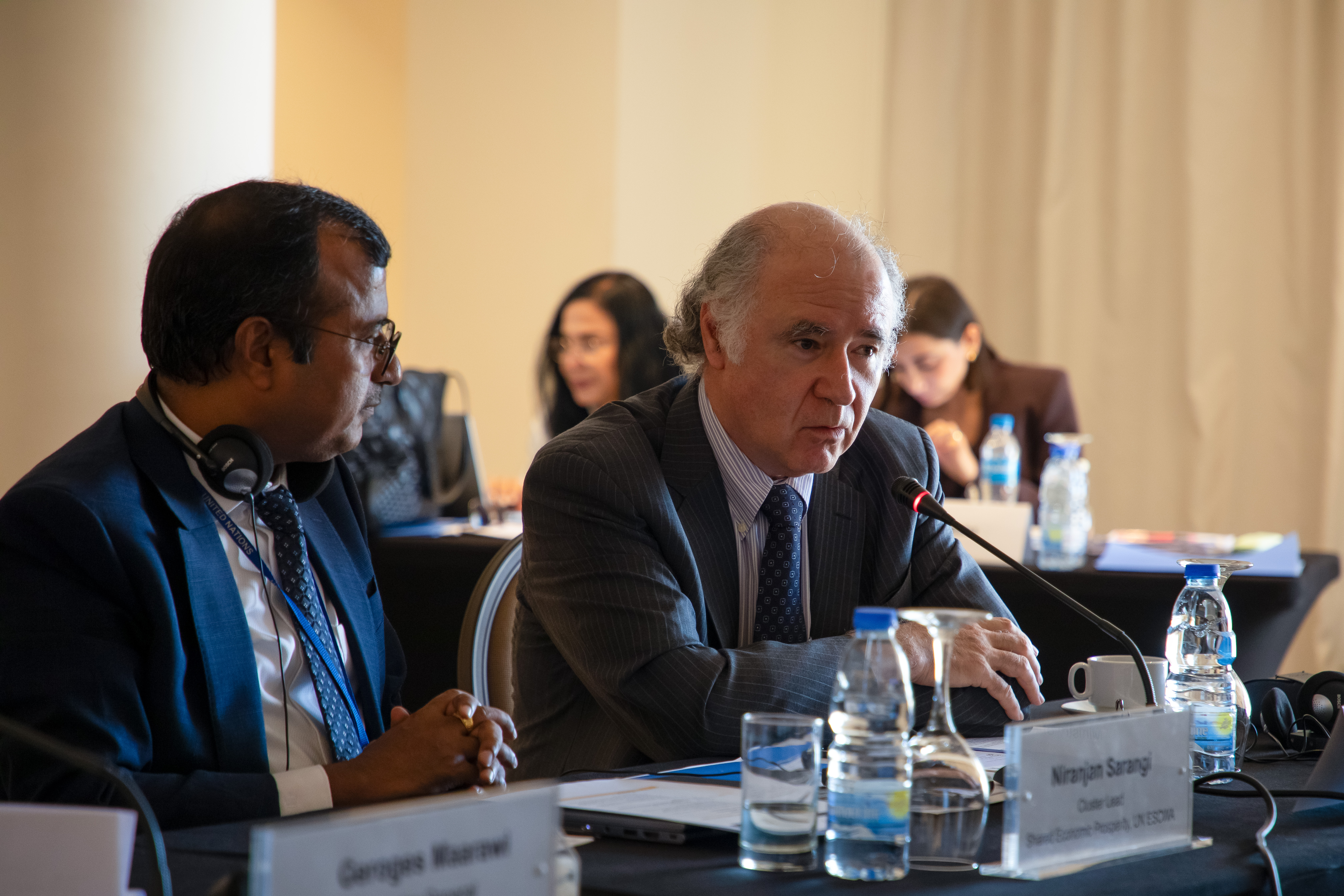 Man speaking on a panel