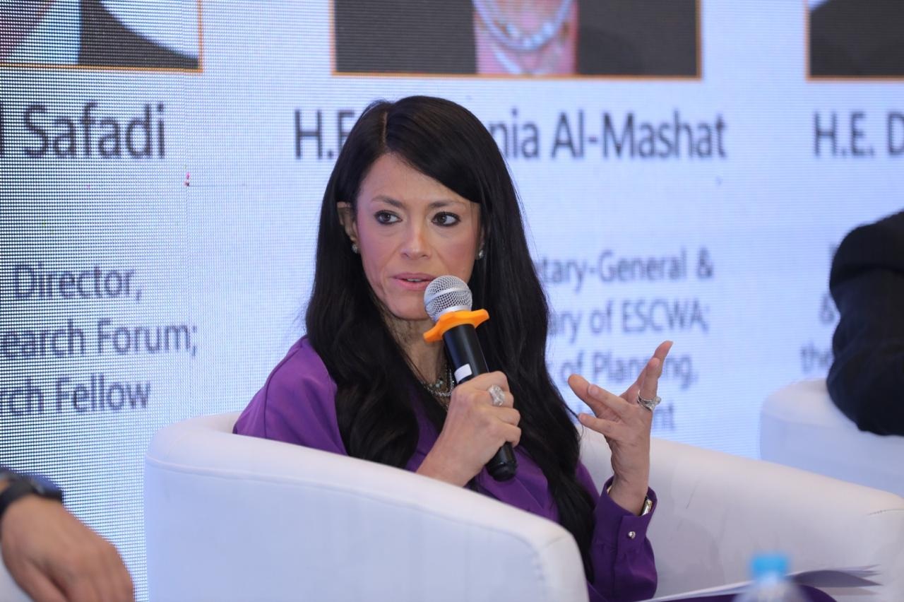 Woman in a panel speaking
