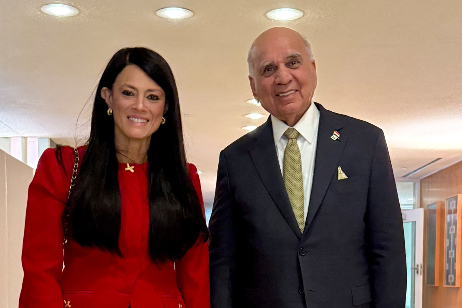 Two officials posing for the photo
