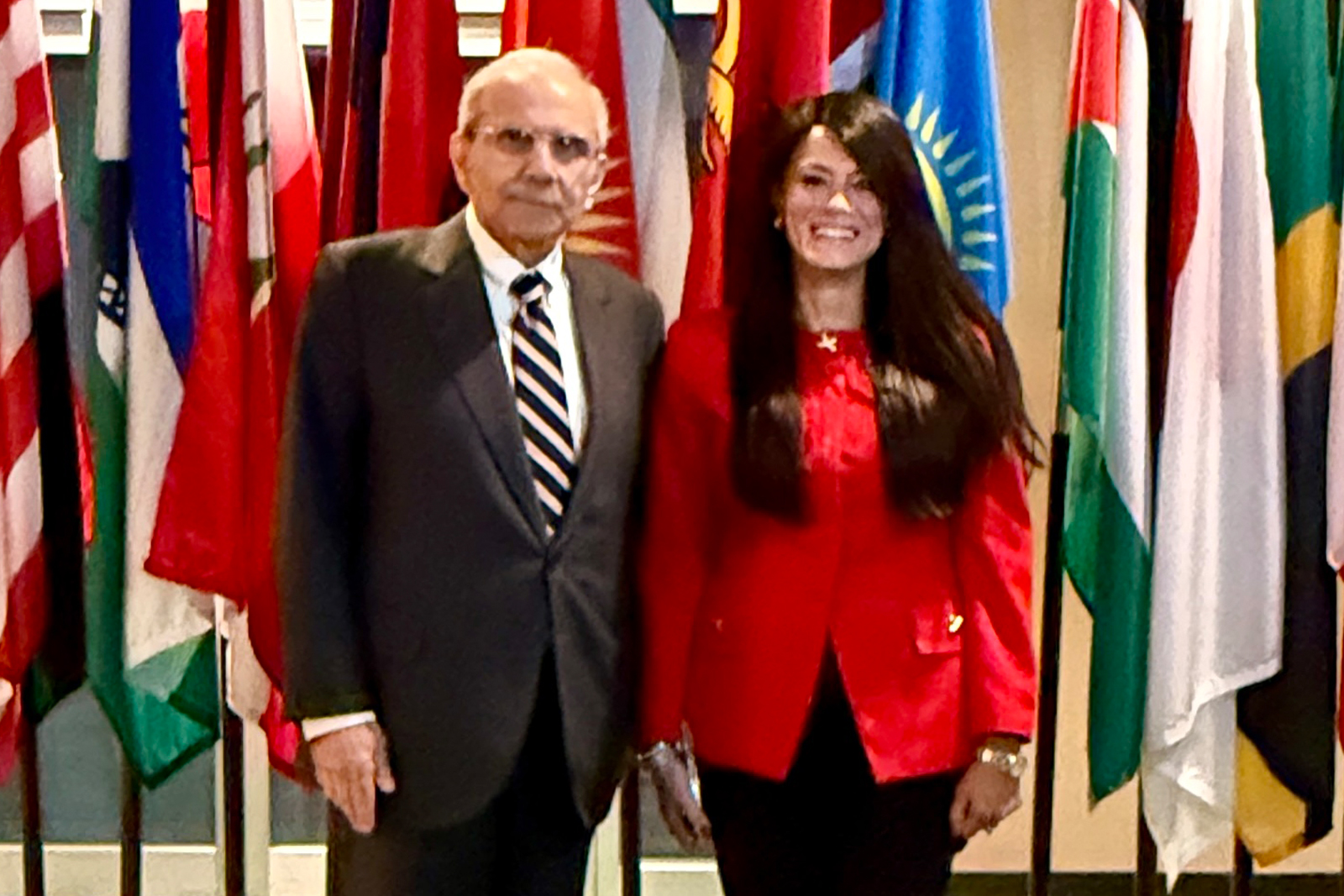 Two officials posing for the photo