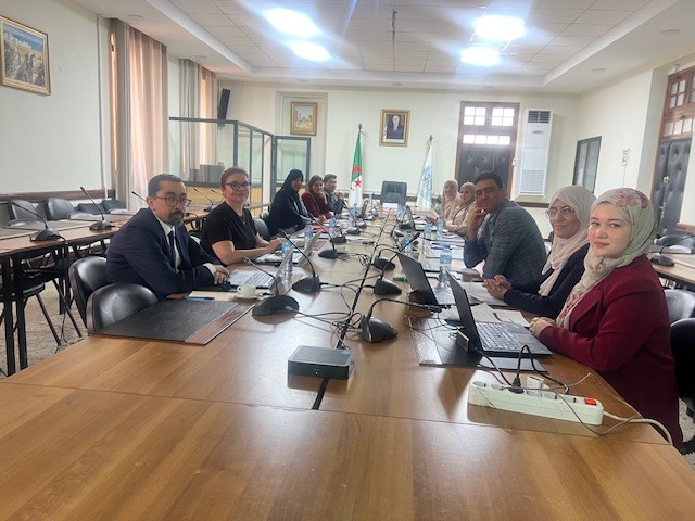 Participants around a meeting