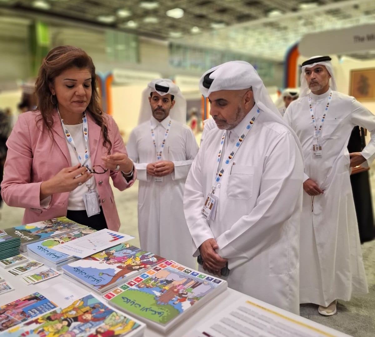 Official with ESCWA official at the SDG Stories booth