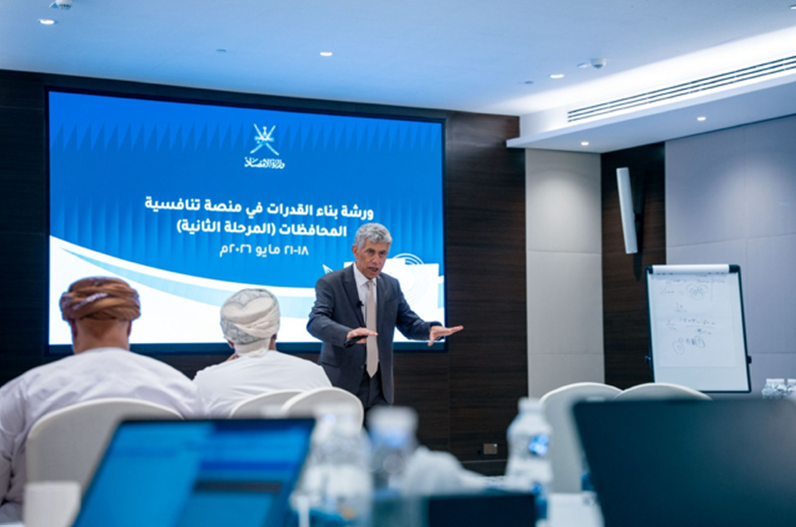 Man presenting in front of audience