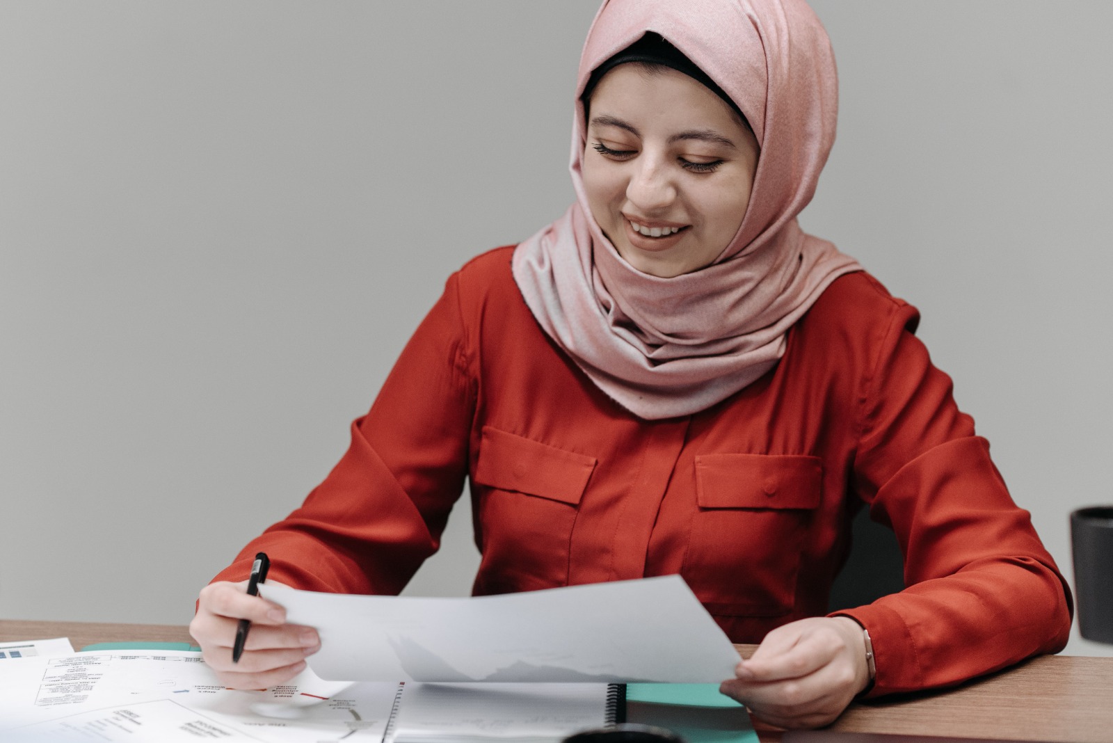 Woman looking in her papers