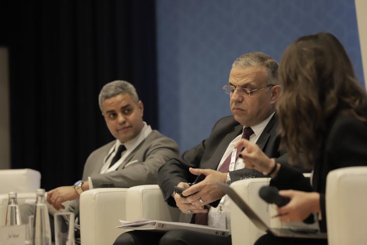 Photo of speakers from the session
