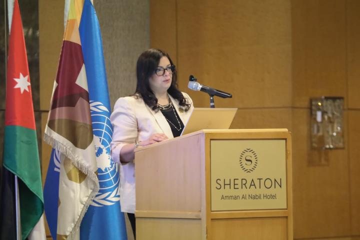 lady speaking behind lectern